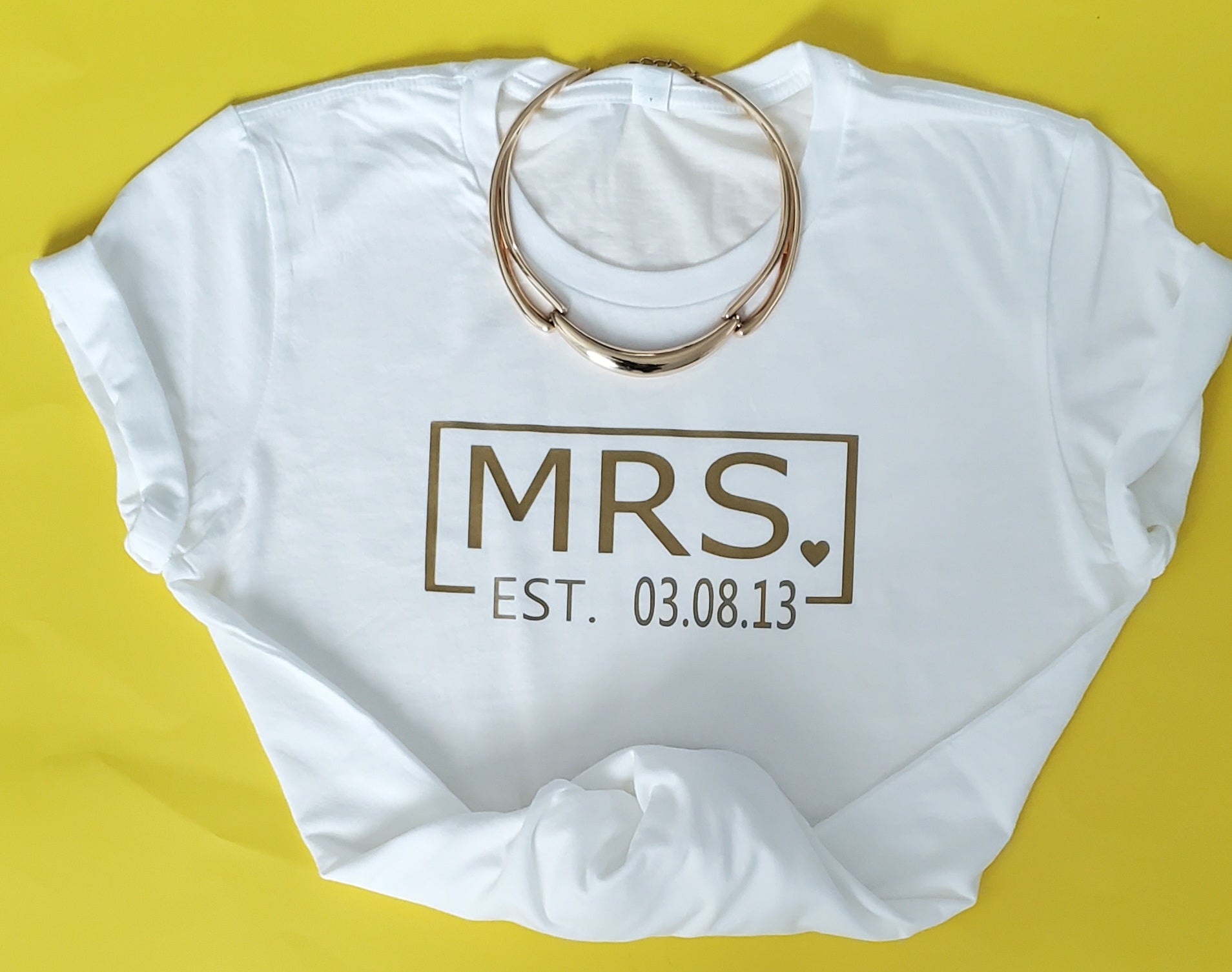 Mr. & Mrs EST Personalized gold print on T-shirt.